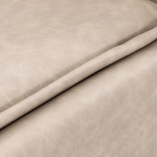 milos-electric-recliner-shampoo-unit-taupe-upholstery-detail.webp