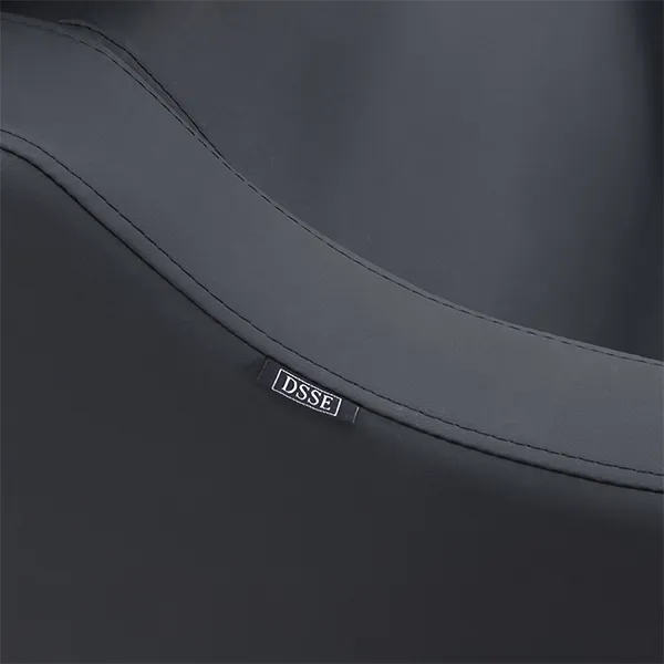 milos-recliner-shampoo-unit-black-logo-and-upholstery-closeup.webp