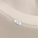 milos-recliner-shampoo-unit-latte-logo-and-upholstery-closeup.webp