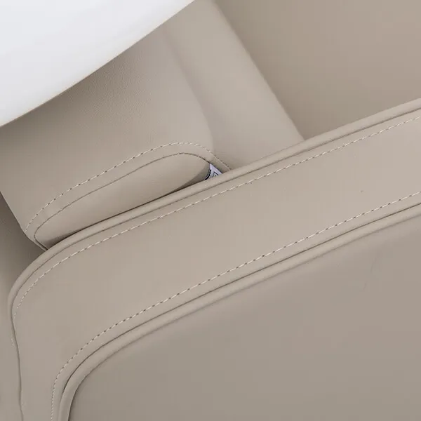 riviera-recliner-shampoo-unit-latte-close-up-stitching-detail.webp