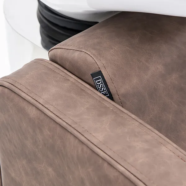 riviera-electric-recliner-shampoo-unit-mocha-close-up-view-armrest-detail.webp