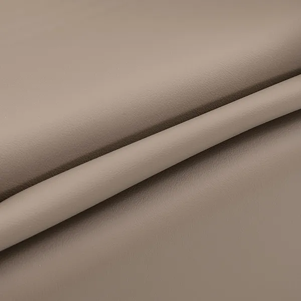 riviera-electric-recliner-shampoo-unit-caramel-upholstery-detail.webp