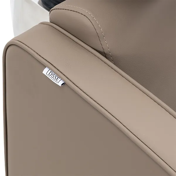 riviera-electric-recliner-shampoo-unit-caramel-stitching-detail.webp