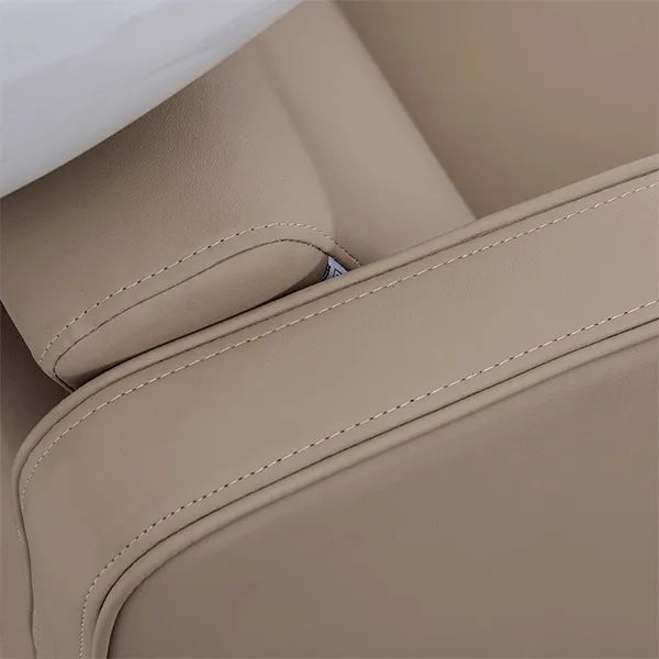 riviera-recliner-shampoo-unit-caramel-close-up-stitching-detail.webp
