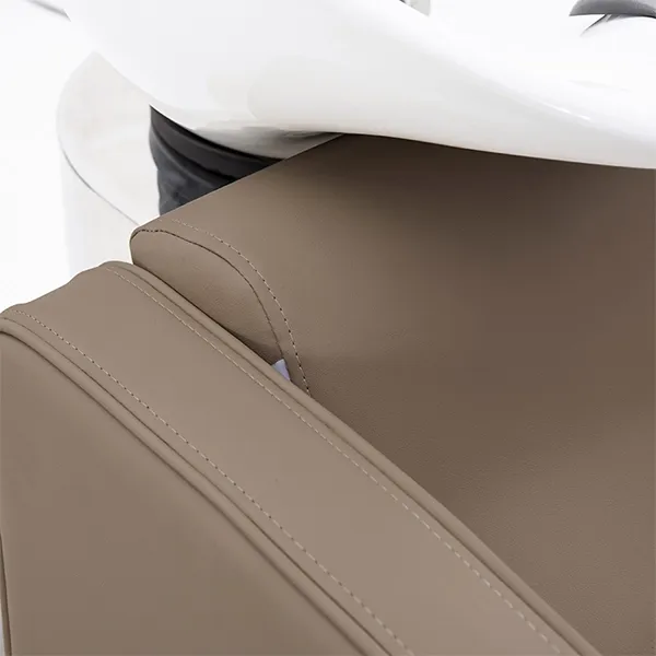 riviera-recliner-shampoo-unit-caramel-close-up-view-armrest-detail.webp