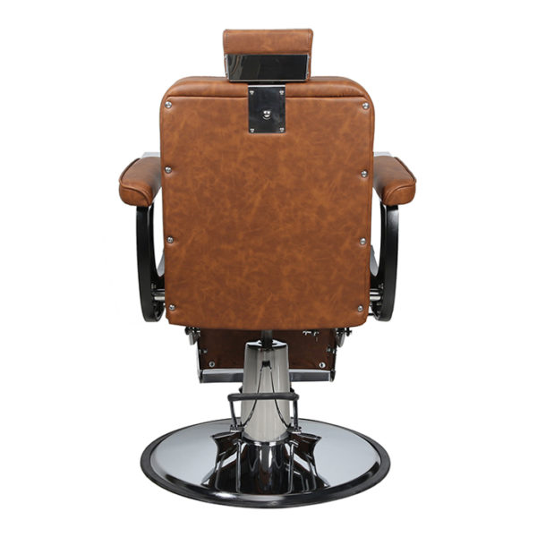 Reclining barber chair in tan with diamond stitching