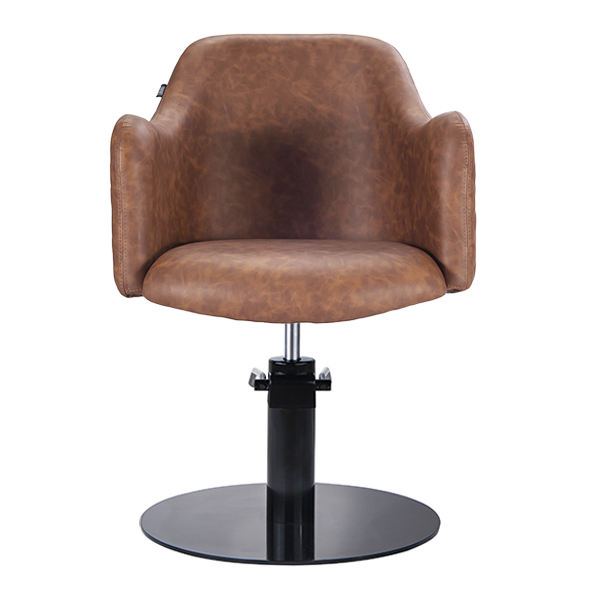 the salon chair is upholstered in premium grade vinyl and diamond stitching