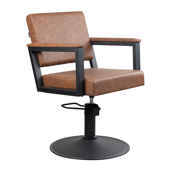 the enyo salon chair has that vintage look with urban lines and upholstered in tan vinyl
