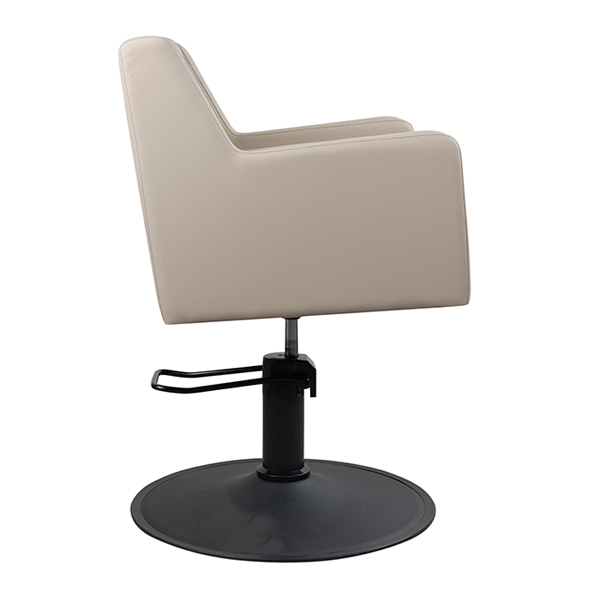 caruso salon chair with hydraulic lift and upholstered in latte vinyl