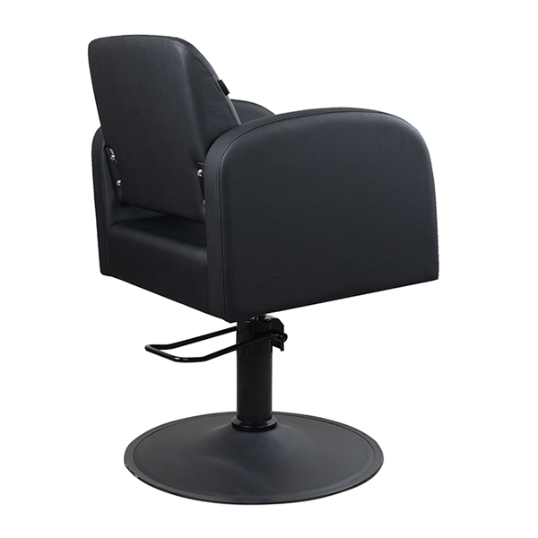 the salon chair is upholstered in premium grade vinyl with straight lines throughout the backrest