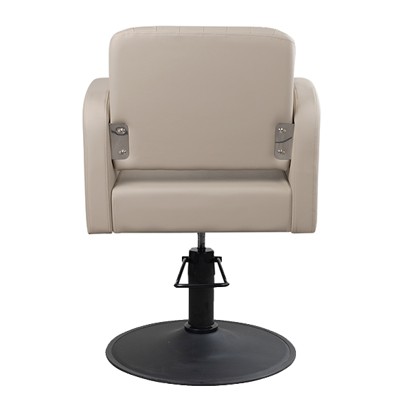 the salon chair is upholstered in premium grade vinyl with straight lines throughout the backrest