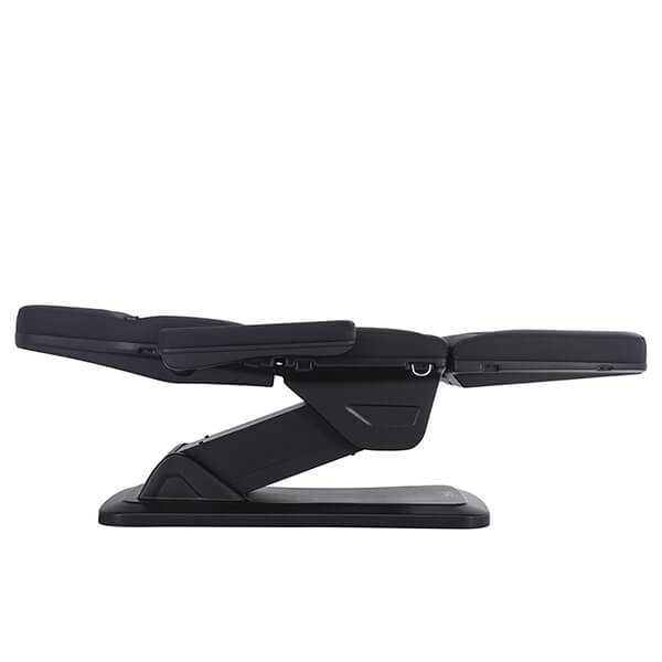eros treatment bed black side view in lowest flat position